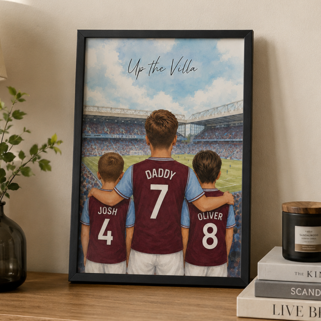 Framed illustrated print of a father and two sons in football shirts at Villa Park